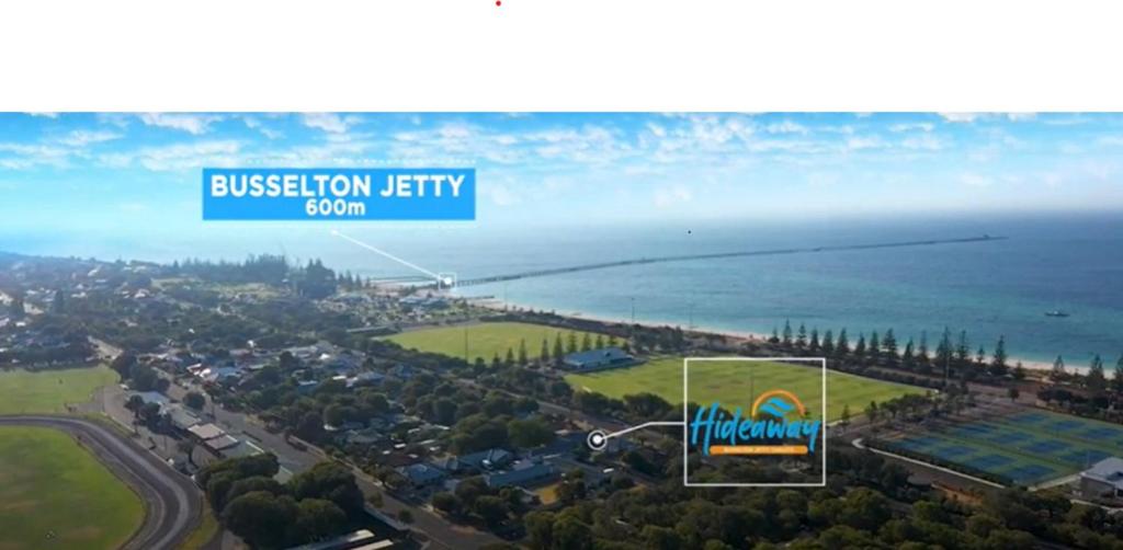 an aerial view of a city and the ocean at Busselton Jetty Chalets in Busselton
