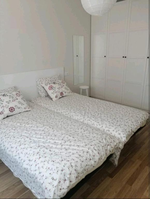 Postel nebo postele na pokoji v ubytování Apartamento La Montañesa en Aínsa, bonito apartamento con grande terraza