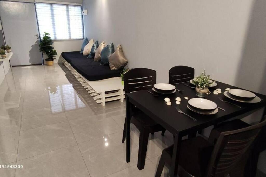 Χώρος καθιστικού στο Margosa Botani Ipoh Homestay 3BR by Grab A Stay