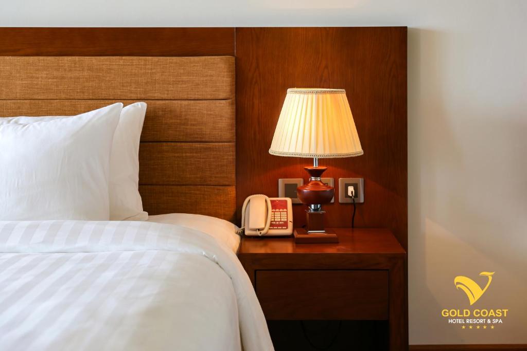 Postel nebo postele na pokoji v ubytování Gold Coast Hotel Resort & Spa