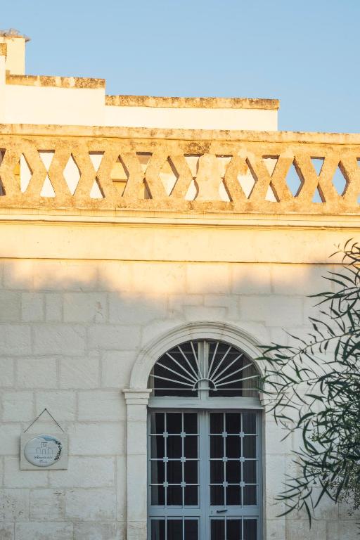 a building with a window on top of it at Masseria della Piana in Villanova di Ostuni