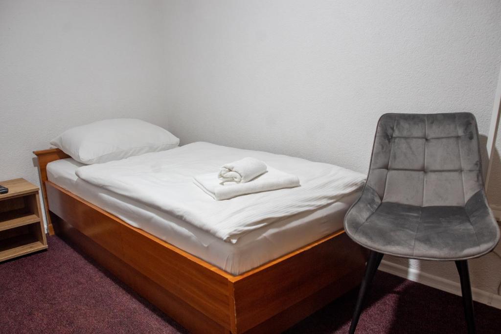 Postel nebo postele na pokoji v ubytování Pansion A&M Vlašić