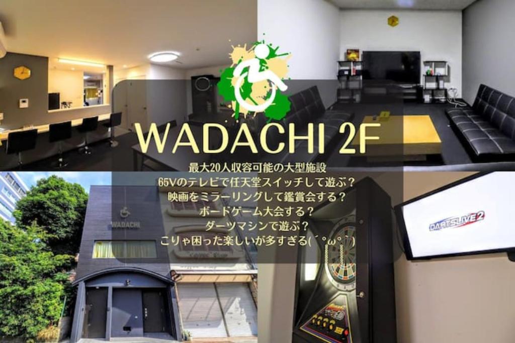 una habitación con una señal de wadkat en la pared en WADACHI en Osaka