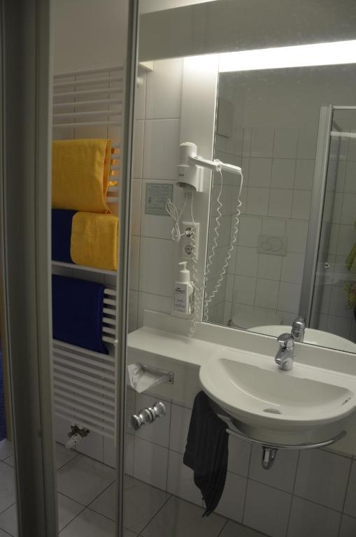 Koupelna v ubytování Hotel Aquamarin