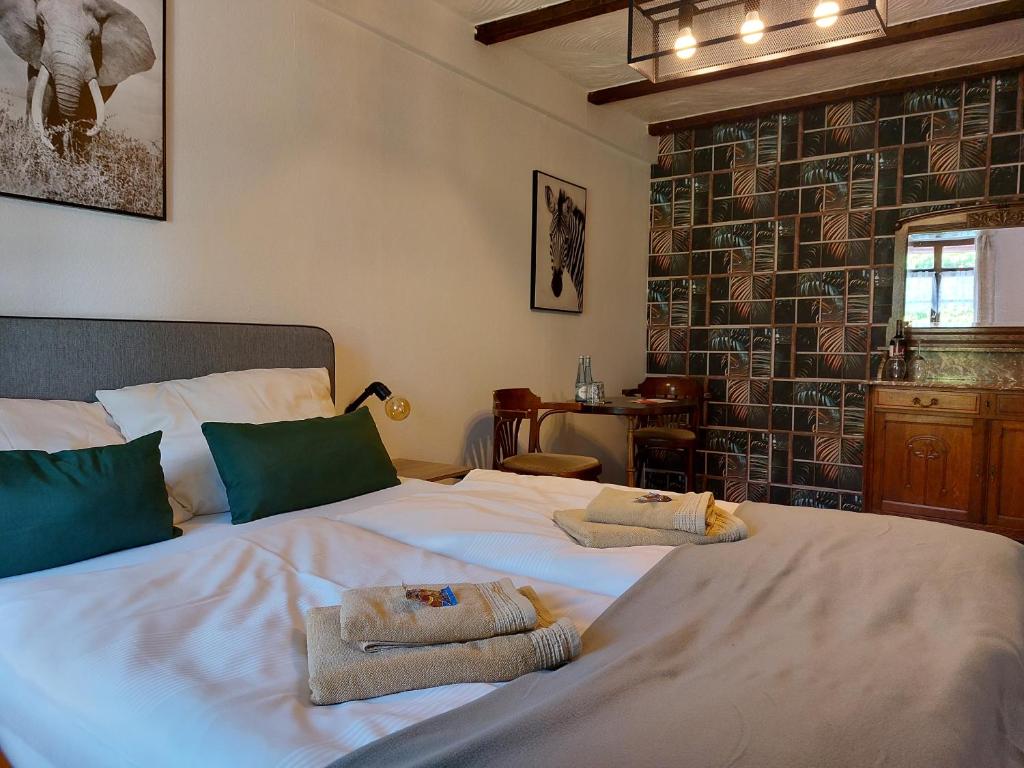 Postel nebo postele na pokoji v ubytování ReSt Inn Monschau