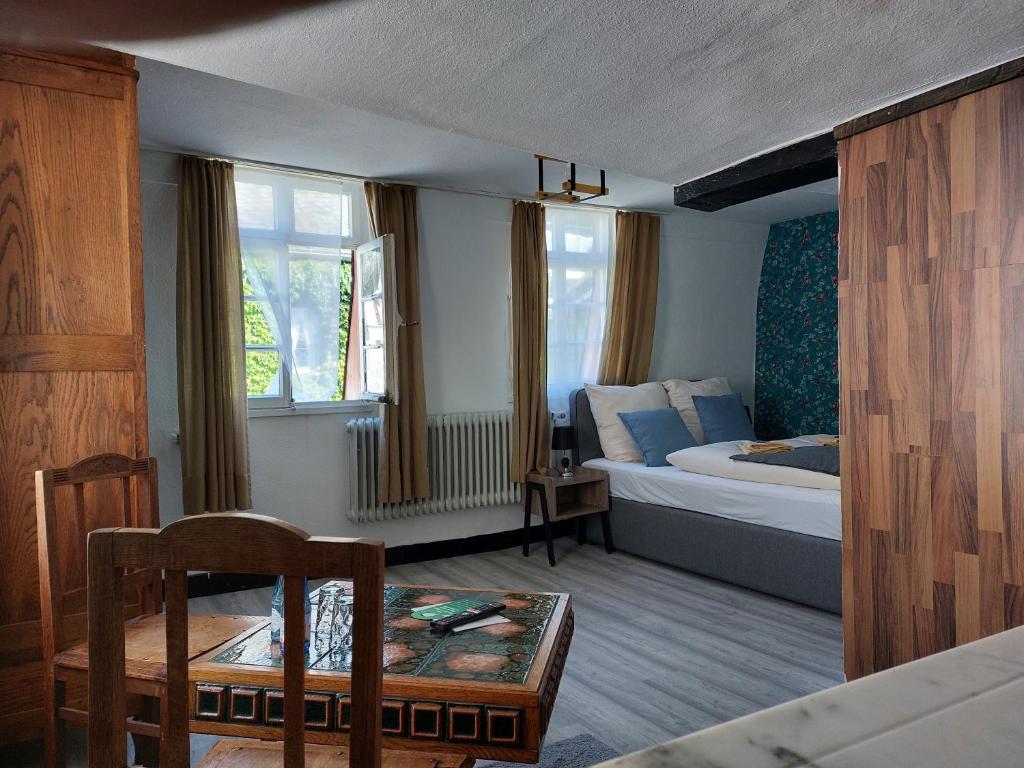 Postel nebo postele na pokoji v ubytování ReSt Inn Monschau