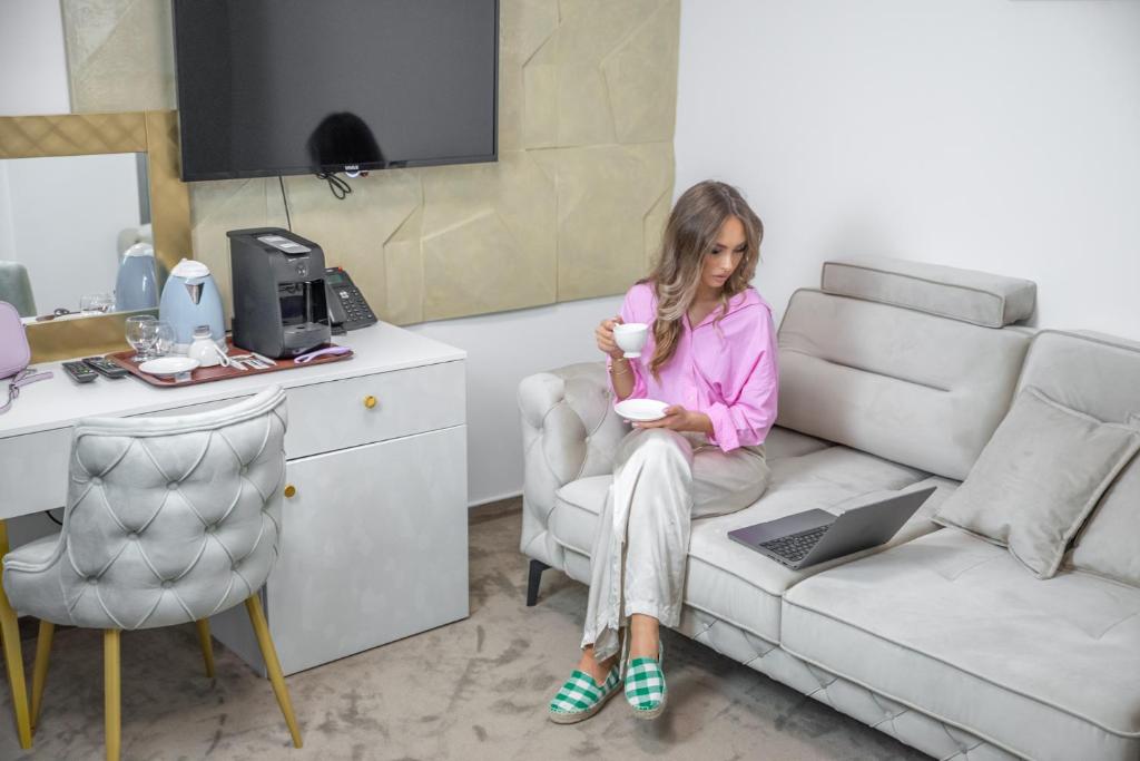 Posezení v ubytování Hotel IDEAL Deluxe