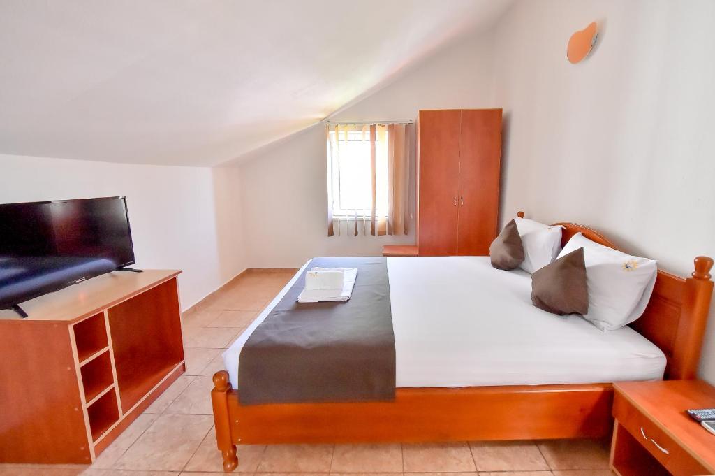 Postel nebo postele na pokoji v ubytování VILA HAVEN - Camere de inchiriat