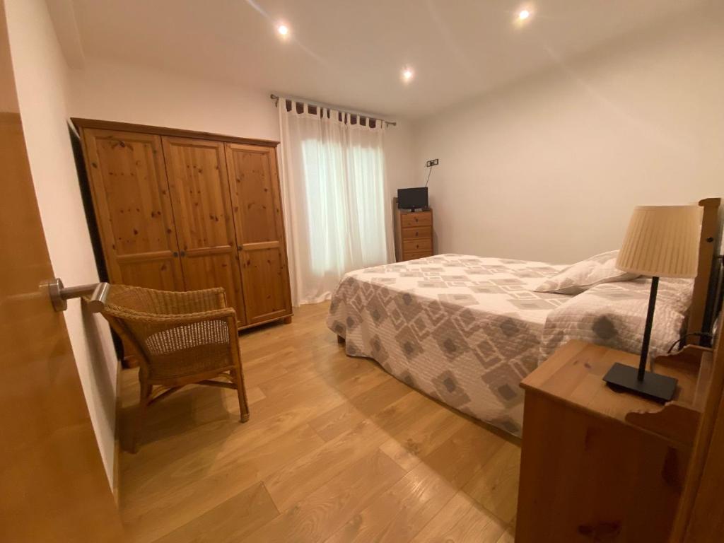 Postel nebo postele na pokoji v ubytování Precioso apartamento con vistas montaña o rio