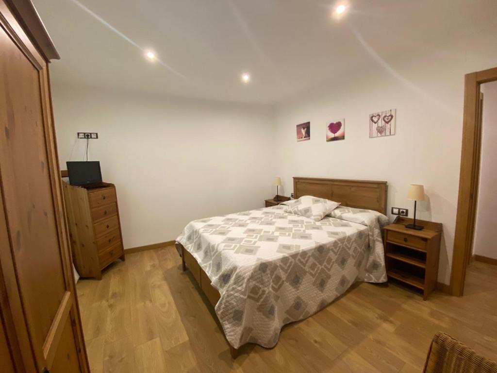 Postel nebo postele na pokoji v ubytování Precioso apartamento con vistas montaña o rio