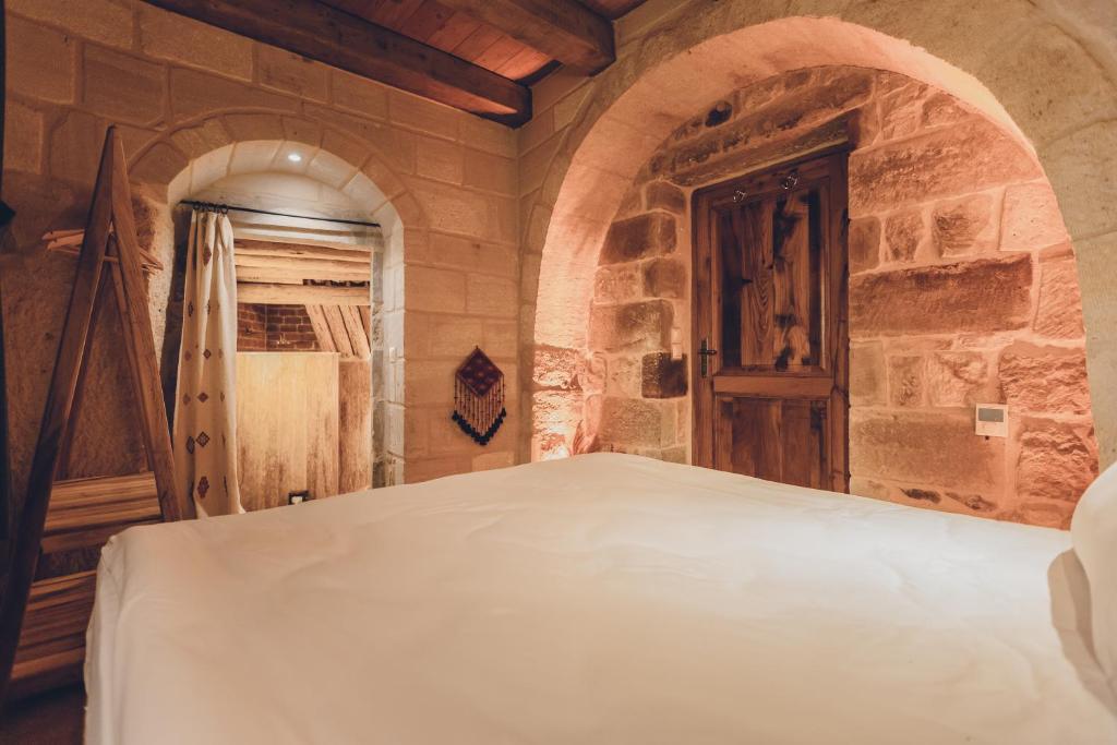 Postel nebo postele na pokoji v ubytování La maison de Şişik