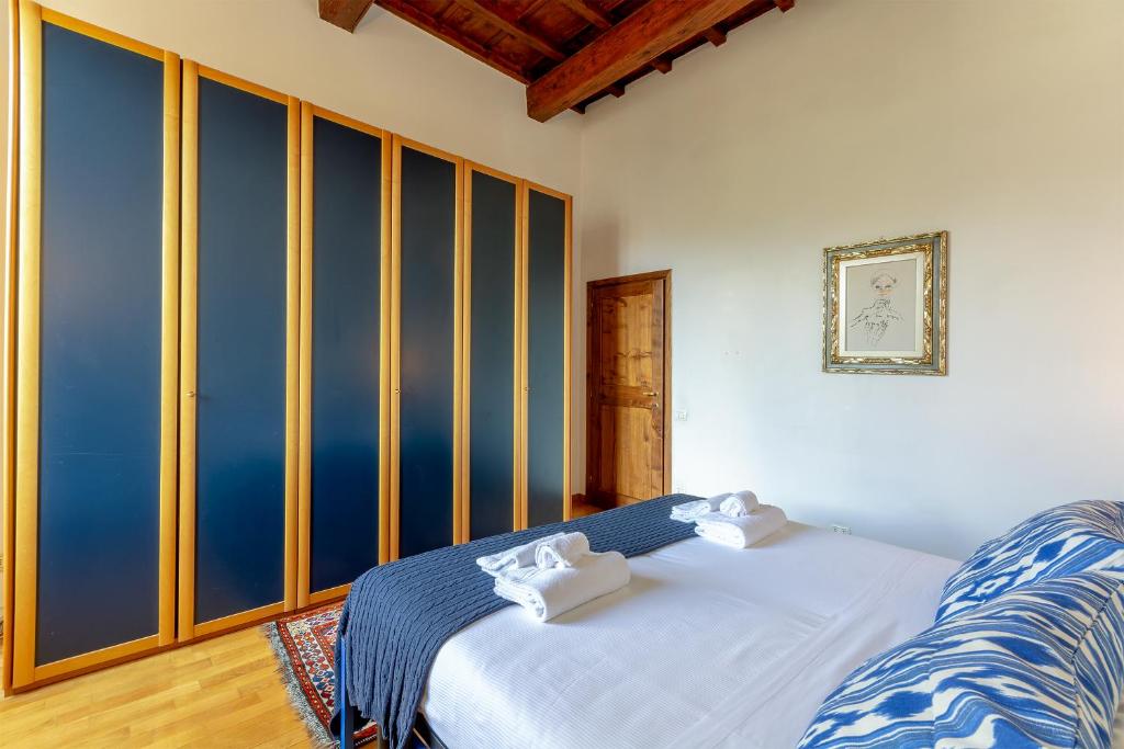 A bed or beds in a room at Discovering Florence