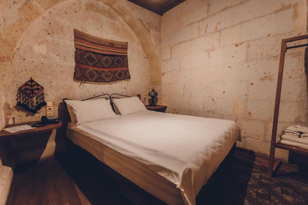 Postel nebo postele na pokoji v ubytování La maison de Şişik