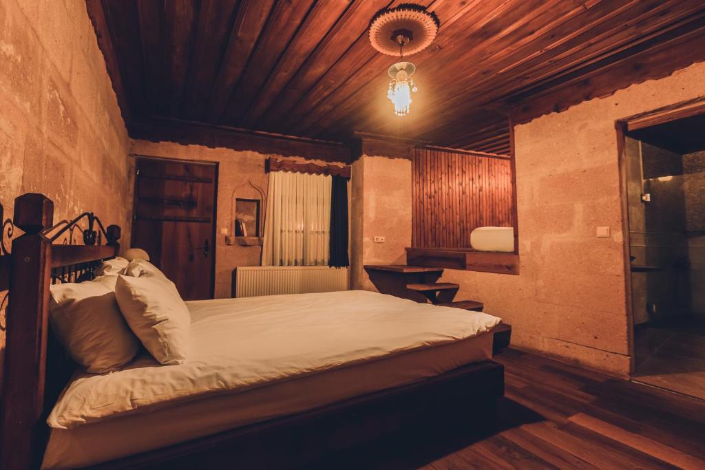 Postel nebo postele na pokoji v ubytování La maison de Şişik