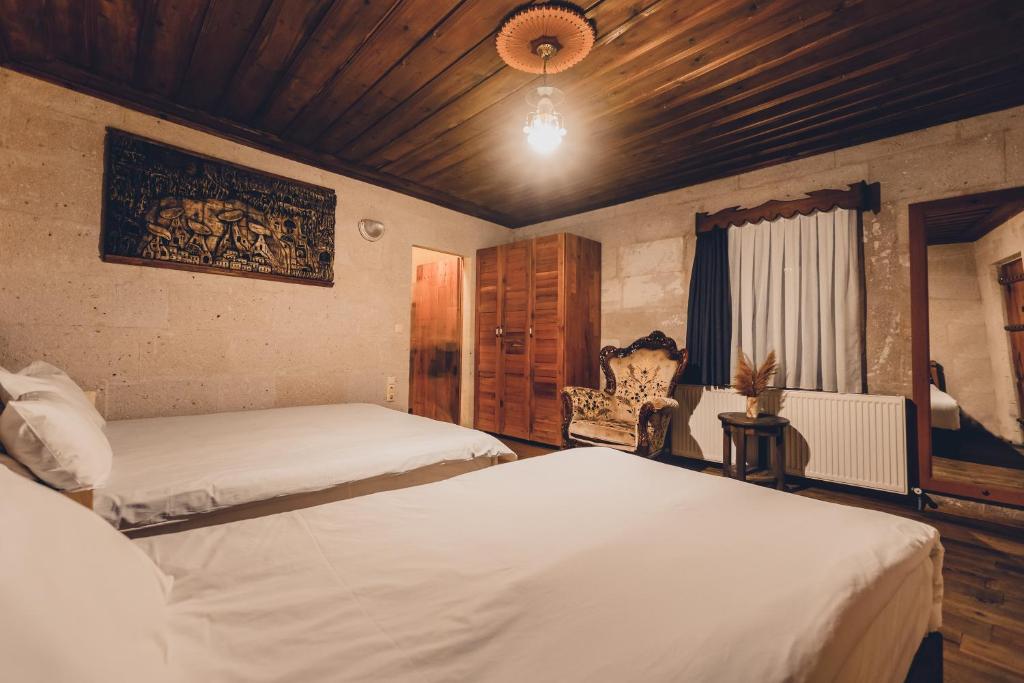 Postel nebo postele na pokoji v ubytování La maison de Şişik