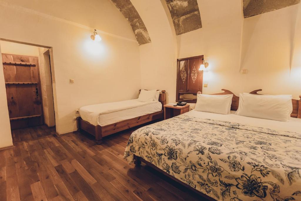 Postel nebo postele na pokoji v ubytování La maison de Şişik