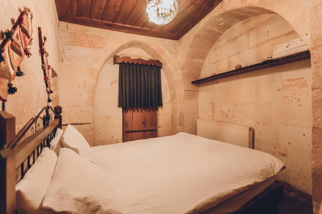 Postel nebo postele na pokoji v ubytování La maison de Şişik