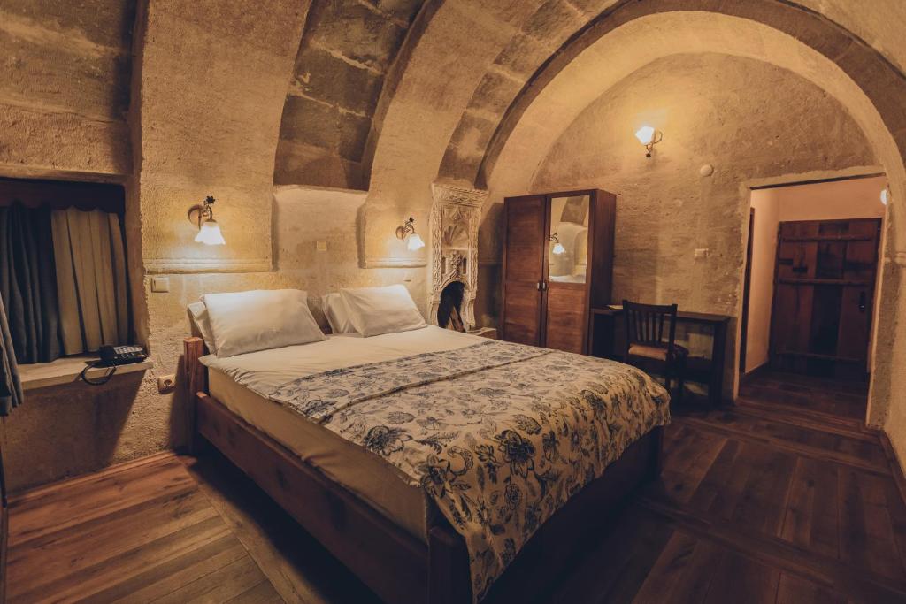 Postel nebo postele na pokoji v ubytování La maison de Şişik