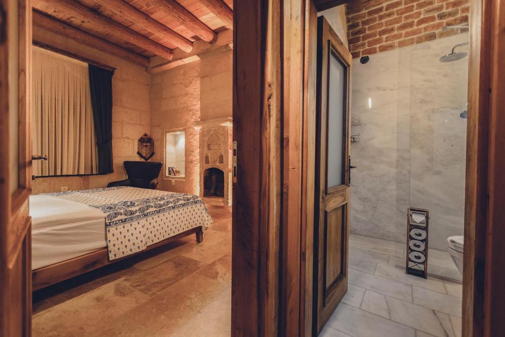 Postel nebo postele na pokoji v ubytování La maison de Şişik
