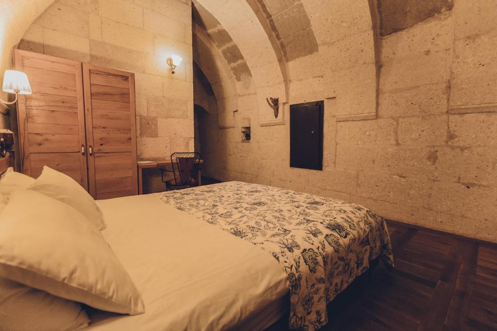 Postel nebo postele na pokoji v ubytování La maison de Şişik