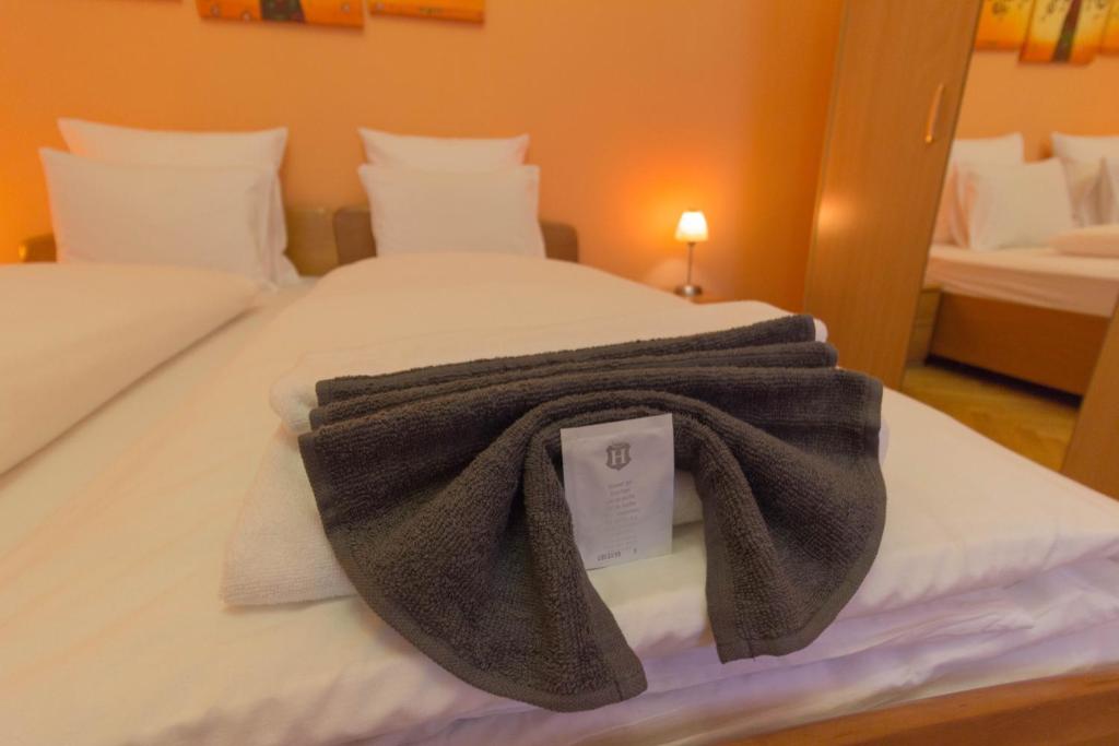 Posteľ alebo postele v izbe v ubytovaní Standard Apartment by Hi5 - Sofie's Suite