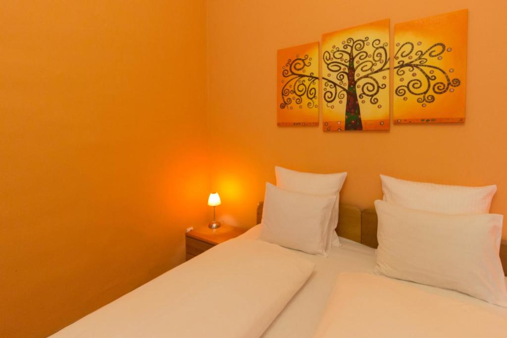 Posteľ alebo postele v izbe v ubytovaní Standard Apartment by Hi5 - Sofie's Suite