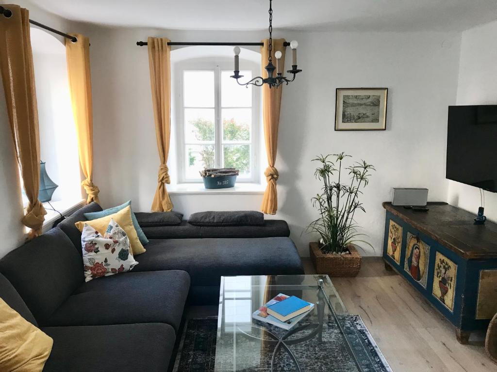 Televízia a/alebo spoločenská miestnosť v ubytovaní Haus Traundorf