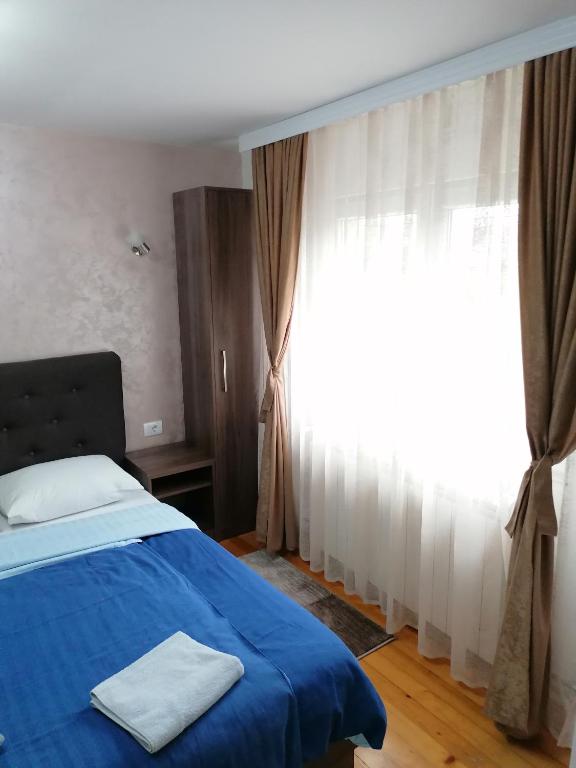 Postel nebo postele na pokoji v ubytování Prenoćište Day Holiday