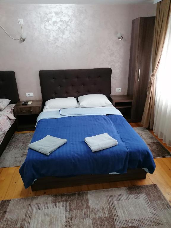 Postel nebo postele na pokoji v ubytování Prenoćište Day Holiday