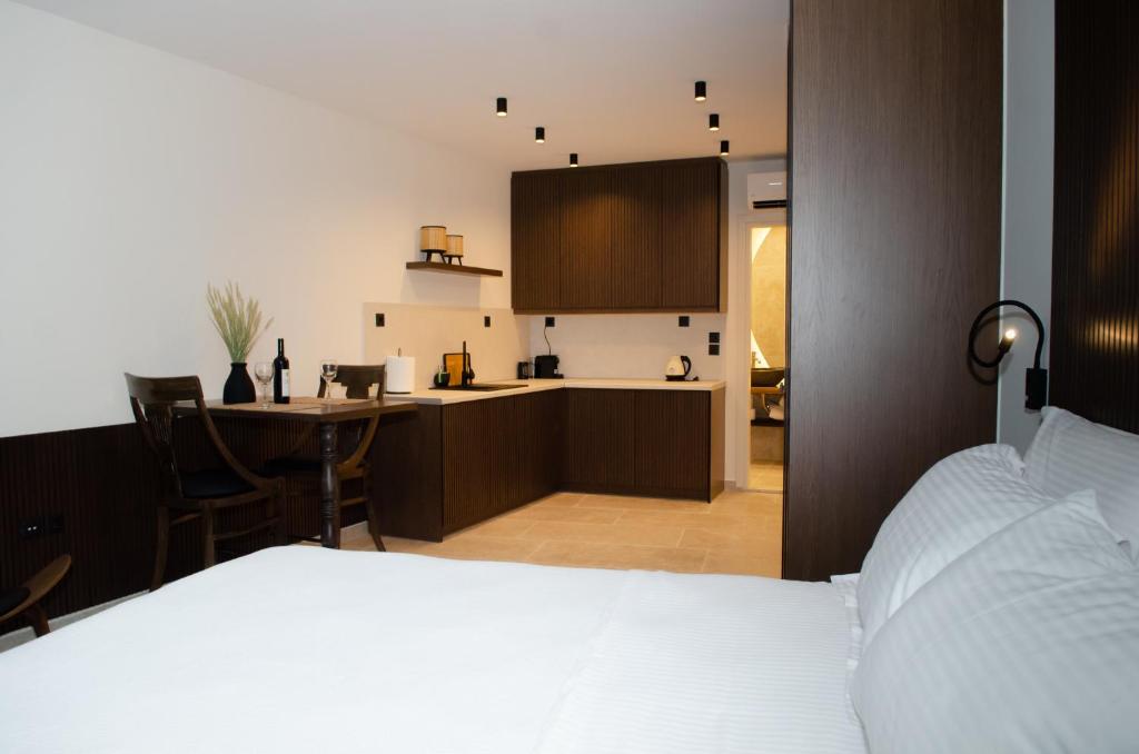 Posteľ alebo postele v izbe v ubytovaní Leone suites