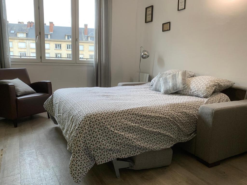 Posteľ alebo postele v izbe v ubytovaní Appartement spacieux lumineux hypercentre