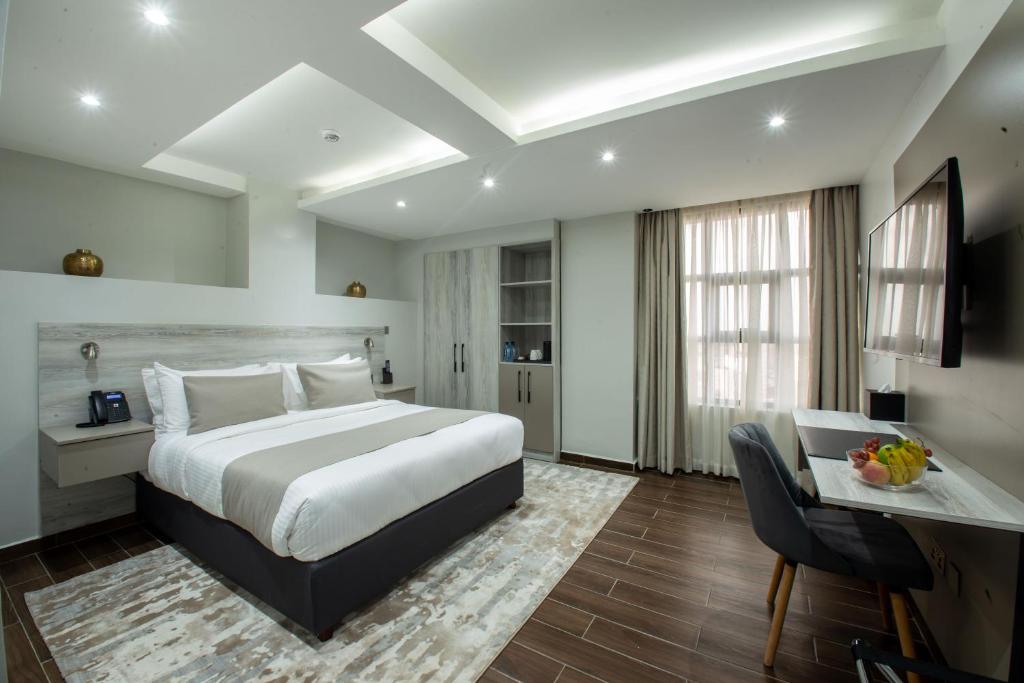 Postel nebo postele na pokoji v ubytování Hotel Mokka City