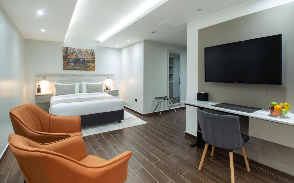 TV a/nebo společenská místnost v ubytování Hotel Mokka City