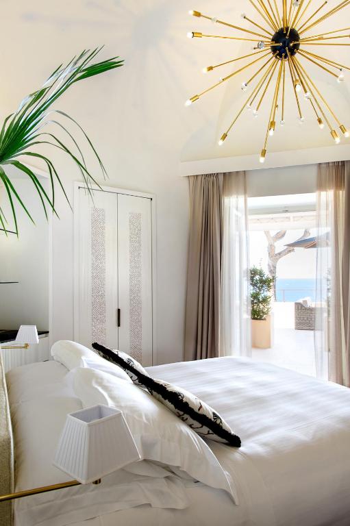 Posteľ alebo postele v izbe v ubytovaní Villa Marina Capri
