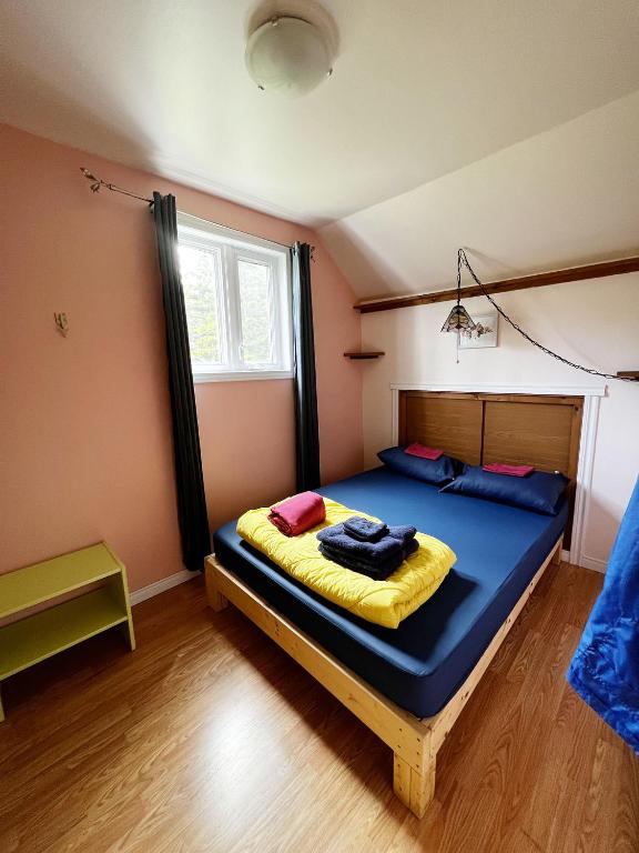 Postel nebo postele na pokoji v ubytování Chill Shack - Auberge Jeunesse