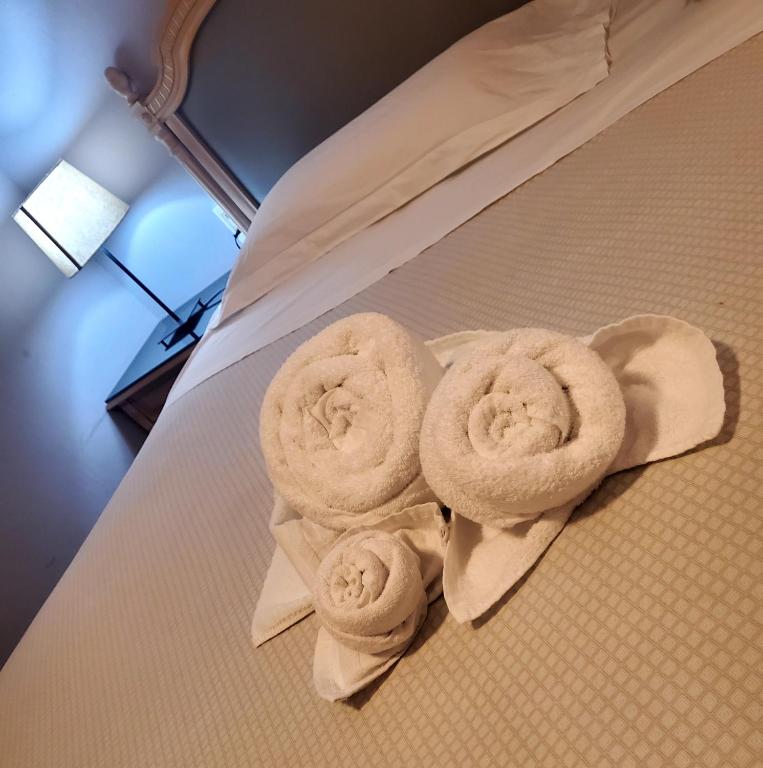 Postel nebo postele na pokoji v ubytování Hotel Fedora