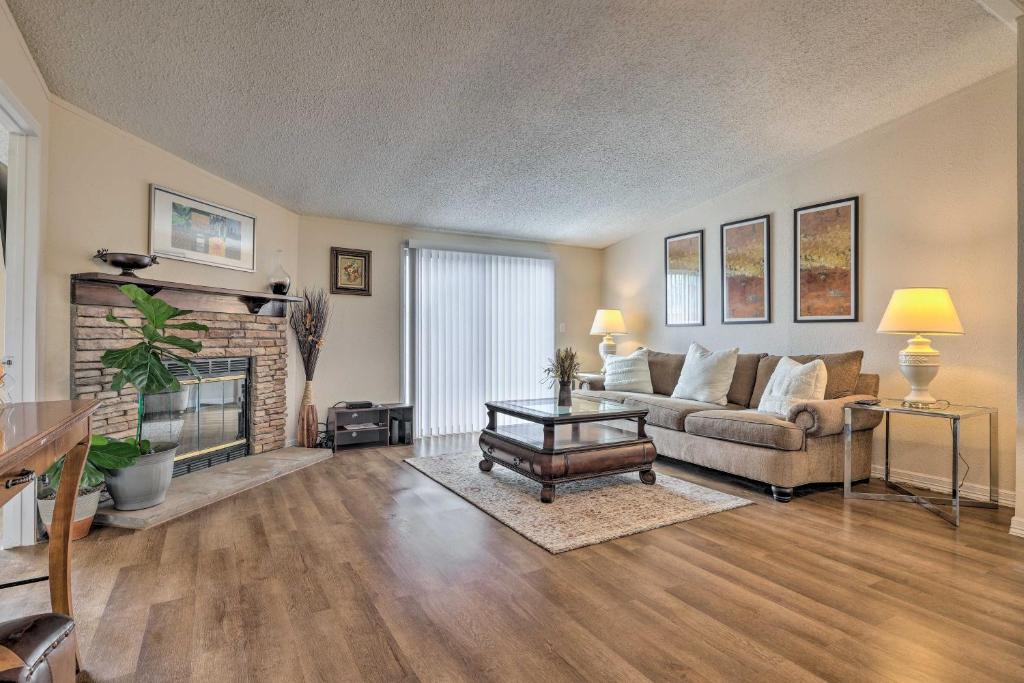 a living room with a couch and a fireplace at Family-Friendly San Marcos Home Close to TSU! in San Marcos