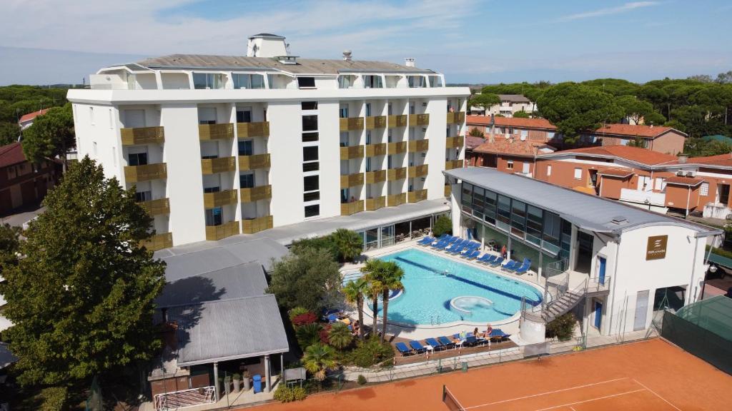 an aerial view of a hotel with a swimming pool at Grand Hotel Esplanada in Bibione