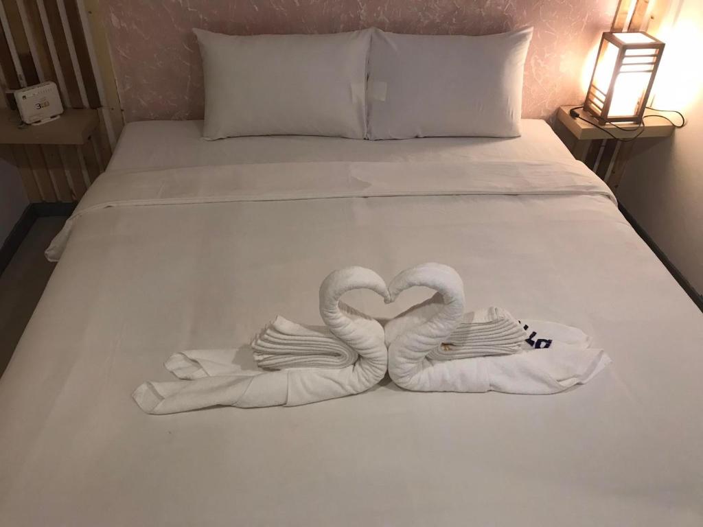 Postel nebo postele na pokoji v ubytování PTK BEACH