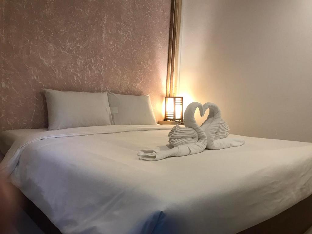 Postel nebo postele na pokoji v ubytování PTK BEACH