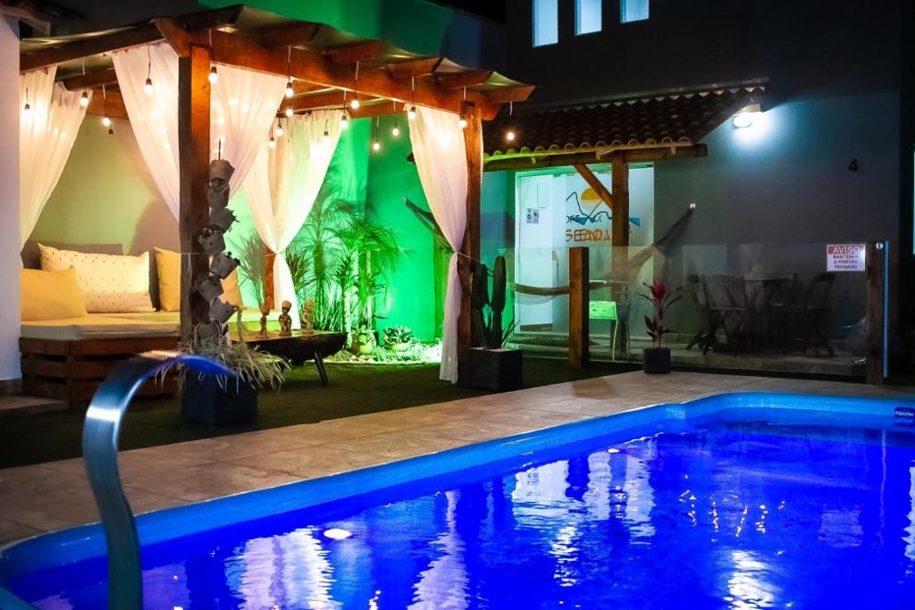 Πισίνα στο ή κοντά στο Pousada Loft Enseada Beach a 200mt da praia