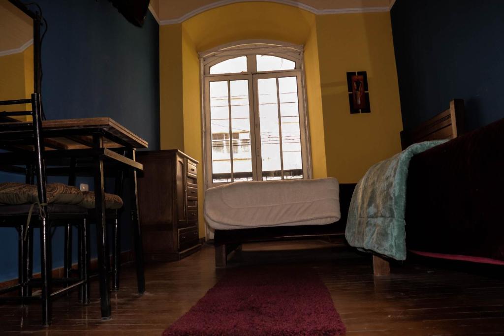 Postel nebo postele na pokoji v ubytování Wake Up Hostel