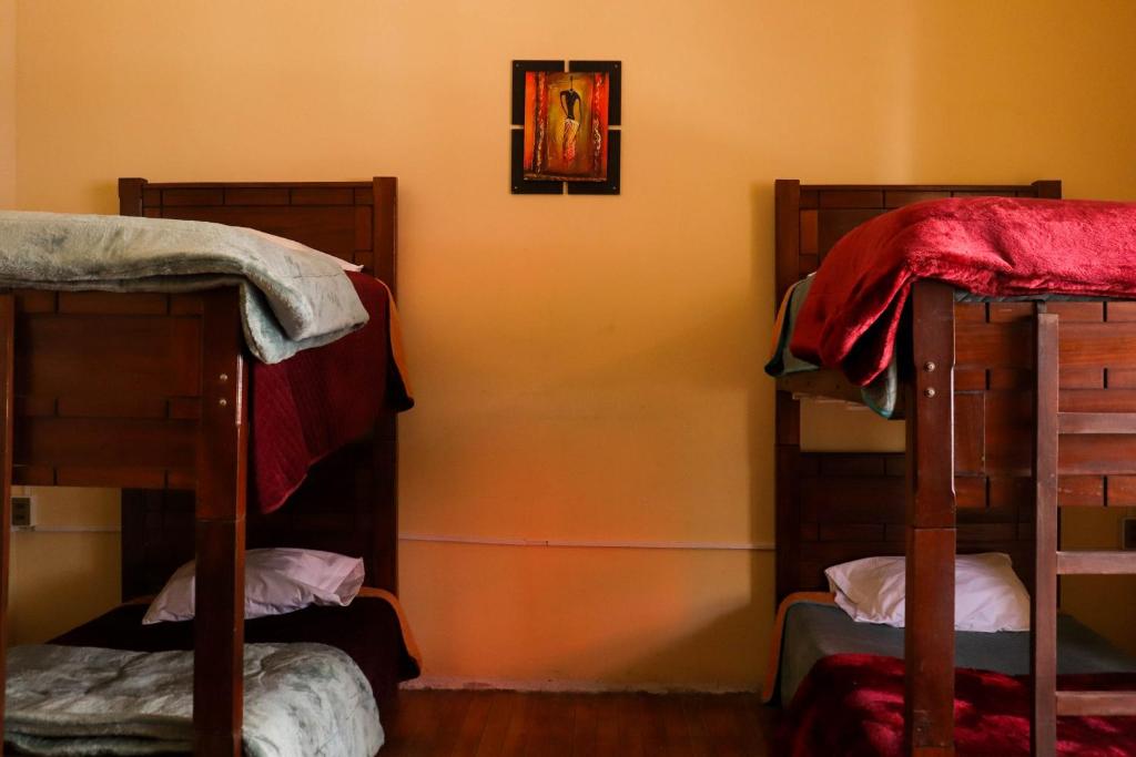 Postel nebo postele na pokoji v ubytování Wake Up Hostel