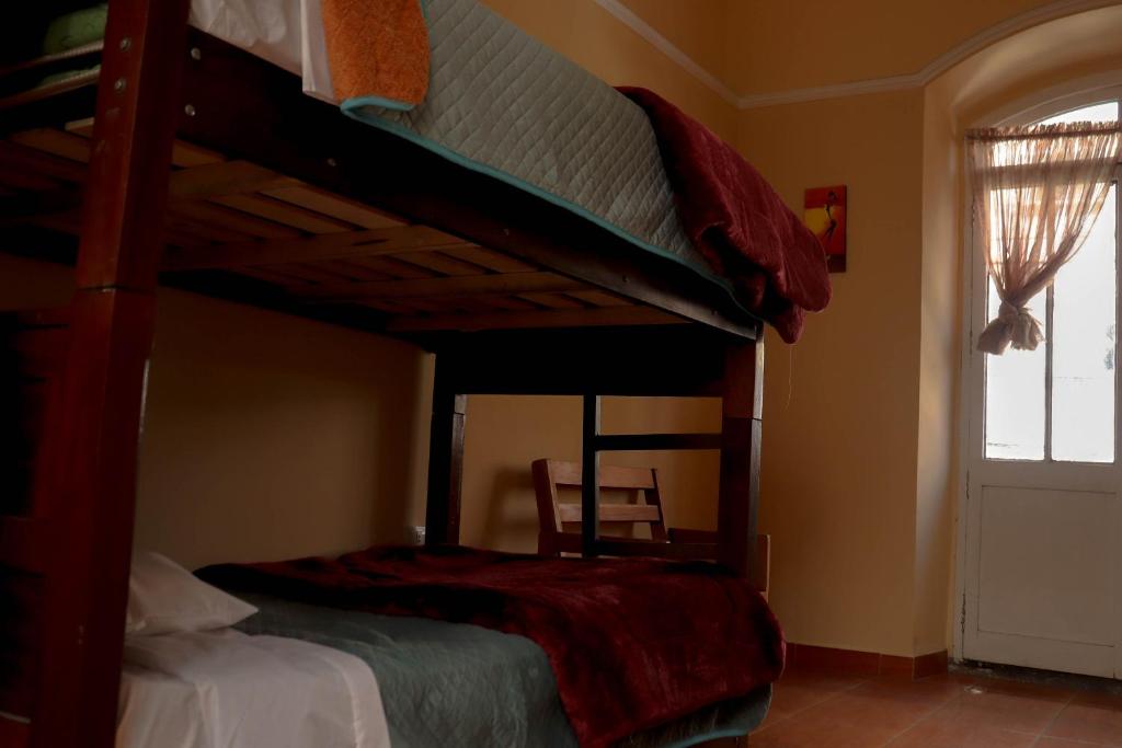 Postel nebo postele na pokoji v ubytování Wake Up Hostel