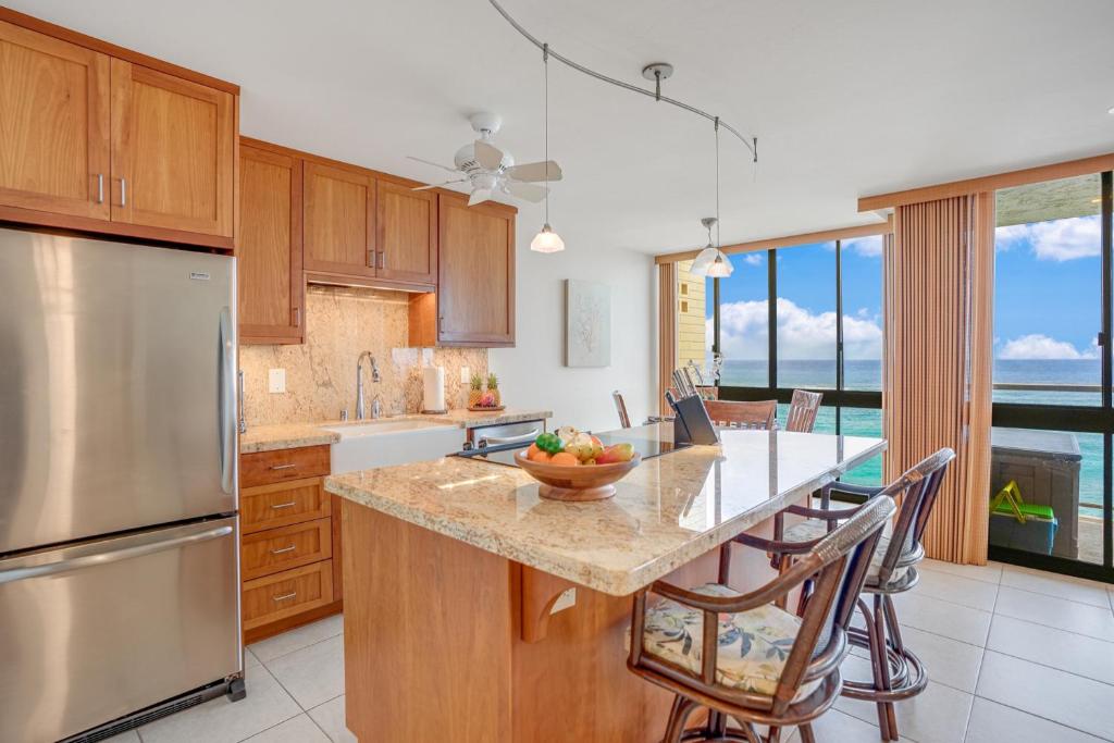 Kuchyň nebo kuchyňský kout v ubytování Kuhio Shores 410