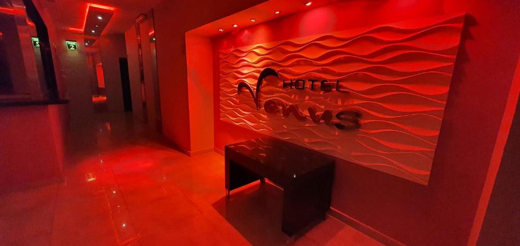 a red room with a sign on the wall at Hotel Venus in Buenos Aires