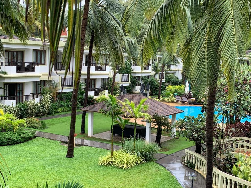 Bazén v ubytování Sonesta Inns Beach Resort - Candolim Beach nebo v jeho okolí