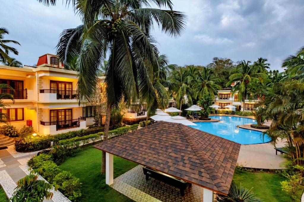 Bazén v ubytování Sonesta Inns Beach Resort - Candolim Beach nebo v jeho okolí