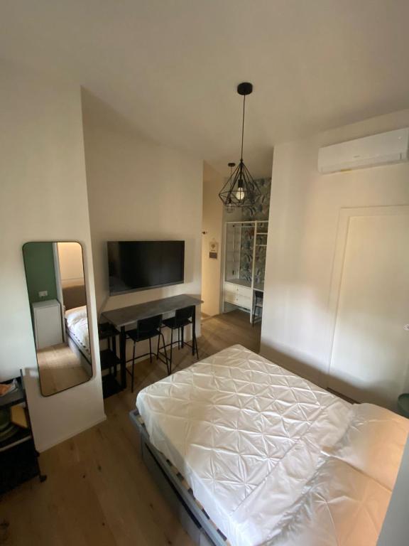 Posteľ alebo postele v izbe v ubytovaní SuiteMilan133 - Navigli SantAgostino