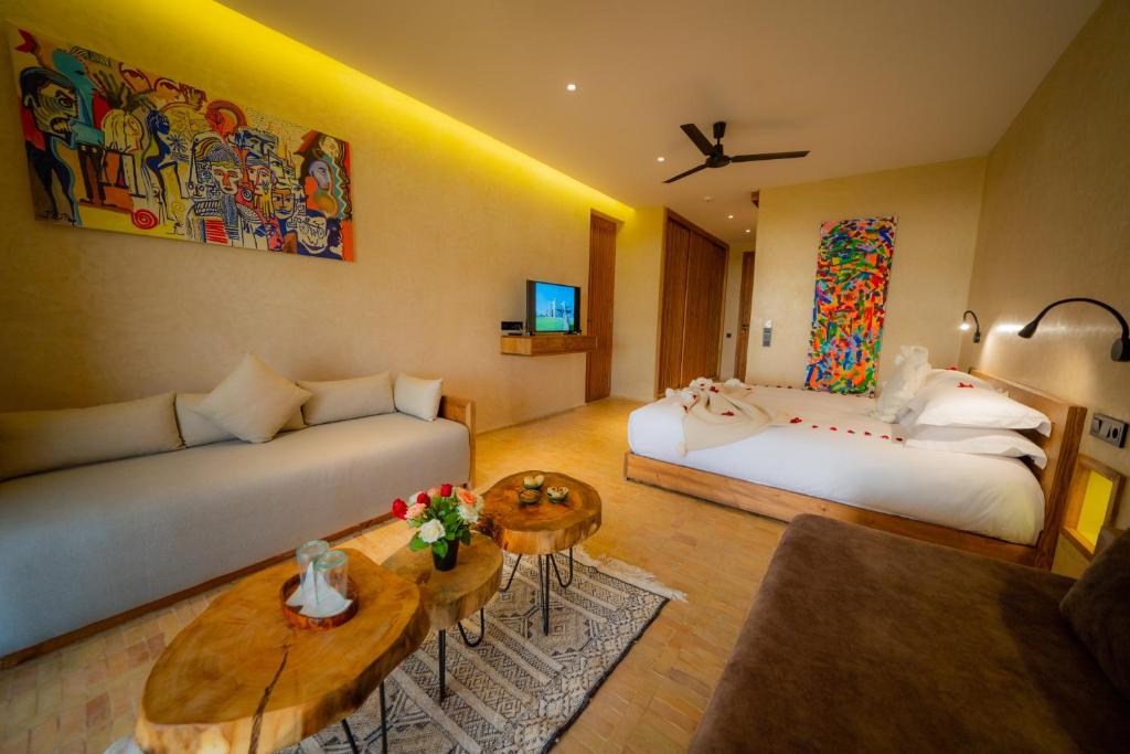 Postel nebo postele na pokoji v ubytování BABERRIH Hôtel Hospitality Palaces & Resorts